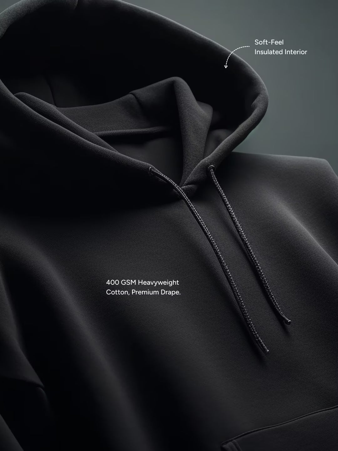 Black hoodie with text highlighting material details on a dark background